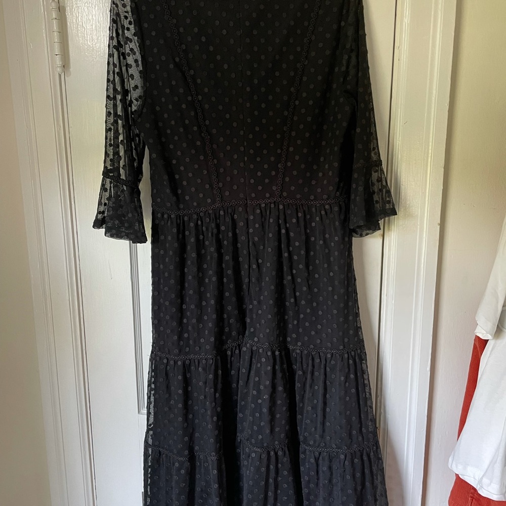 Bodensee Black dress with polka dots a d sheer arms